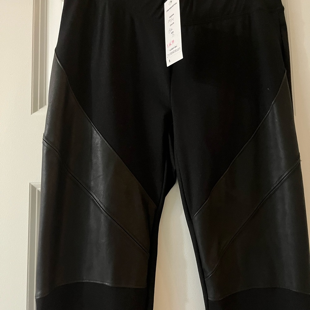 Bebe Black Skinny Pants with Stretchy Fit and faux black leather accents.